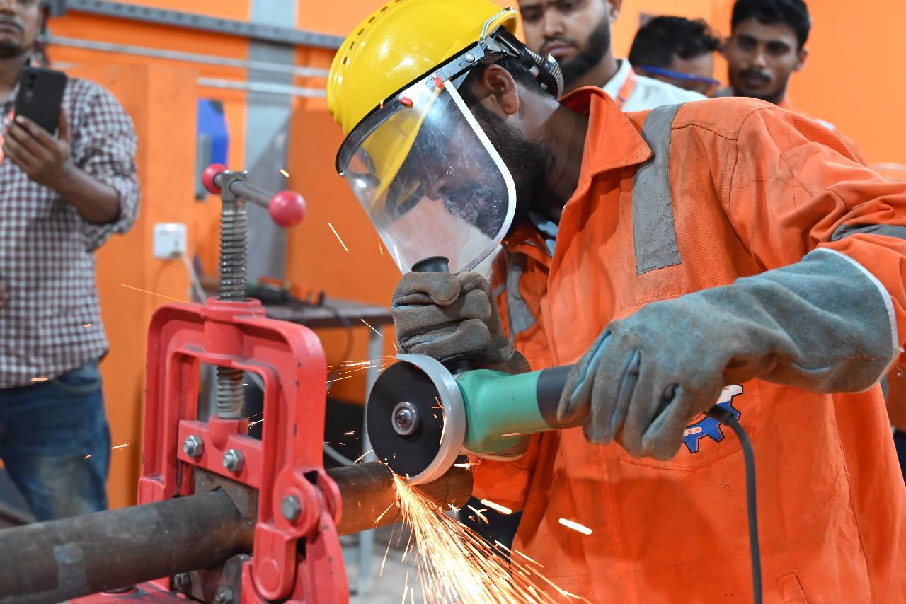 Trade-tested skilled workers from Bangladesh receiving practical technical training and competency assessment for Saudi Arabia and GCC construction projects at AMCO Skill Bangladesh.